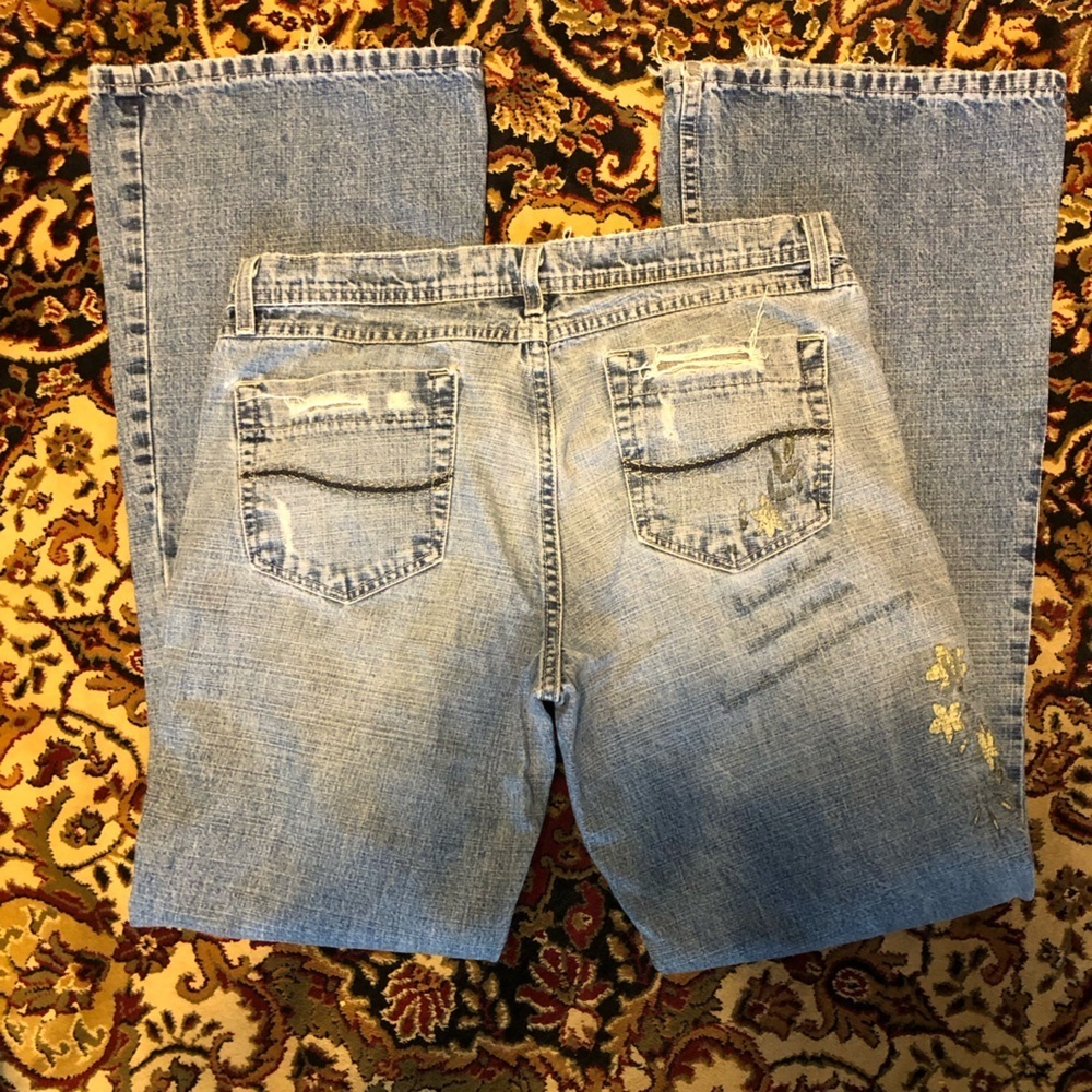 Blue flare Jeans with Distressed Details 13 - Picture 9 of 13
